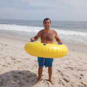 Enjoying the day at Smith's Point beach with my tube