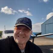Me in Ronaldsway airport at Private Hangar with a twin Piper aircraft.....cold....